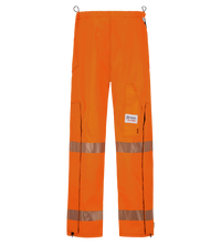 The Lac-Mac Women's Pant, High-Visibility FR/ARC Rated (710FWAC) features US markings, orange fabric with reflective silver stripes, multiple pockets, and black zipper cuffs—ideal PPE for women needing arc-flash protection.