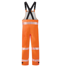 The Lac-Mac Multi-Haz Protective Overall 706ZABH, designed for flammable liquid chemical hazards, features high-visibility orange GORE-TEX PYRAD fabric, black adjustable straps, and reflective leg bands, displayed on a plain white background.