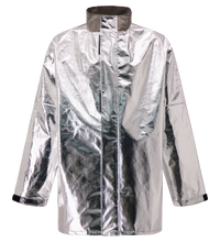 The Lac-Mac Limited Aluminized Protective Jacket 707MA is a long-sleeved, silver jacket with black-trimmed cuffs and high collar, made for molten splash protection. ASTM F955 compliant. Displayed on a plain white background.