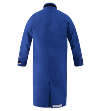 A blue Lac-Mac 707ZD Multi-Haz Protective Duster Coat for flammable liquid chemical hazards is shown from the back, featuring long sleeves, a high collar, and knee-length coverage for enhanced safety.